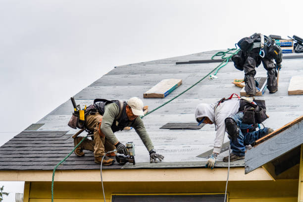 Professional Gutter Installation technician working in Dighton, MA